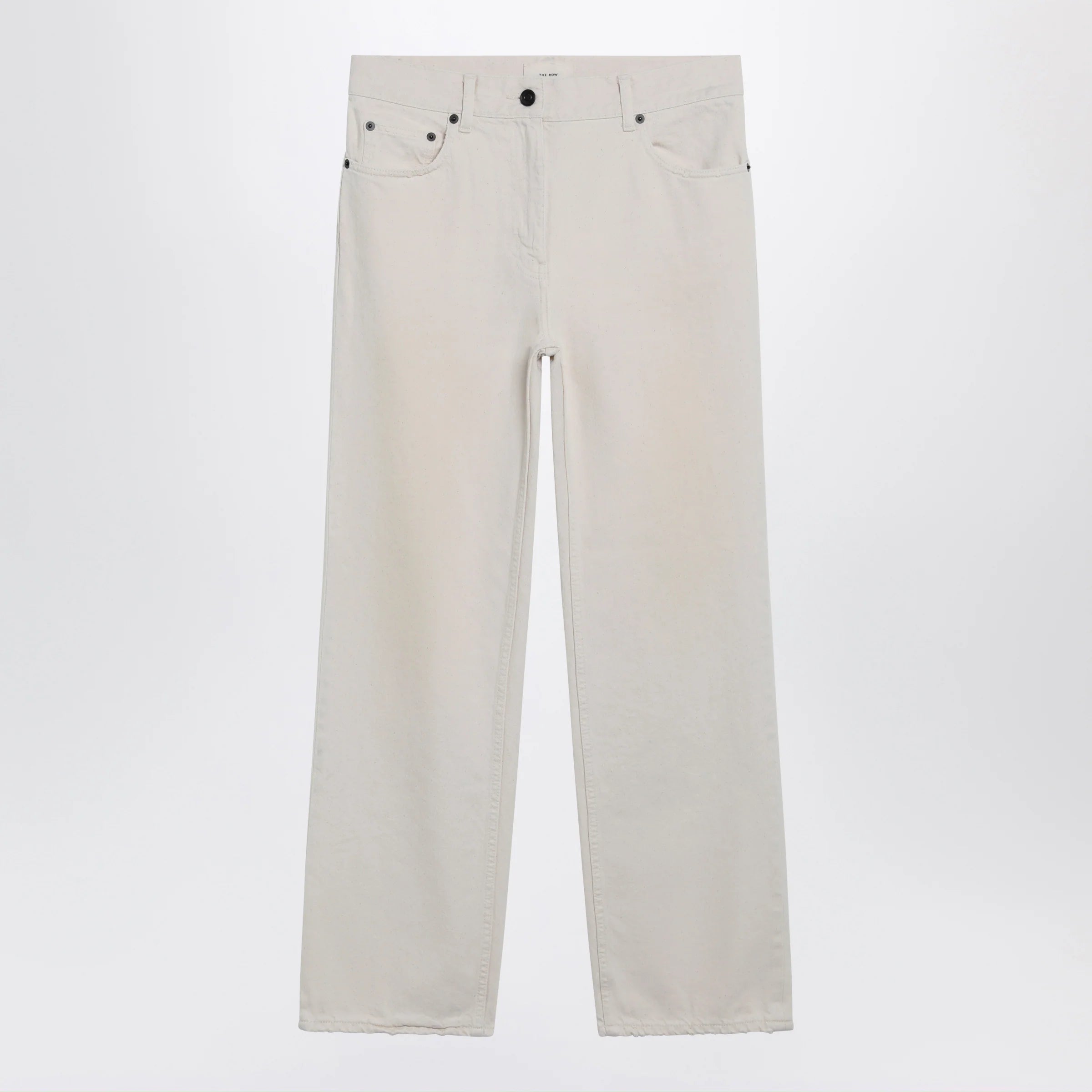 The Row Fargo jeans in lightly distressed cotton denim, ecru