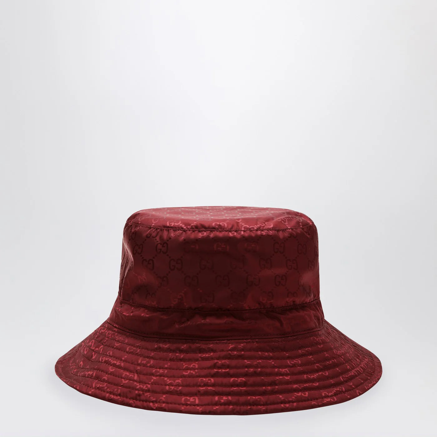 GUCCI Reversible burgundy nylon GG hat