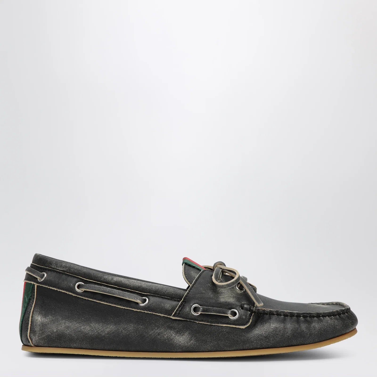 GUCCI Black boat shoes with washed effect