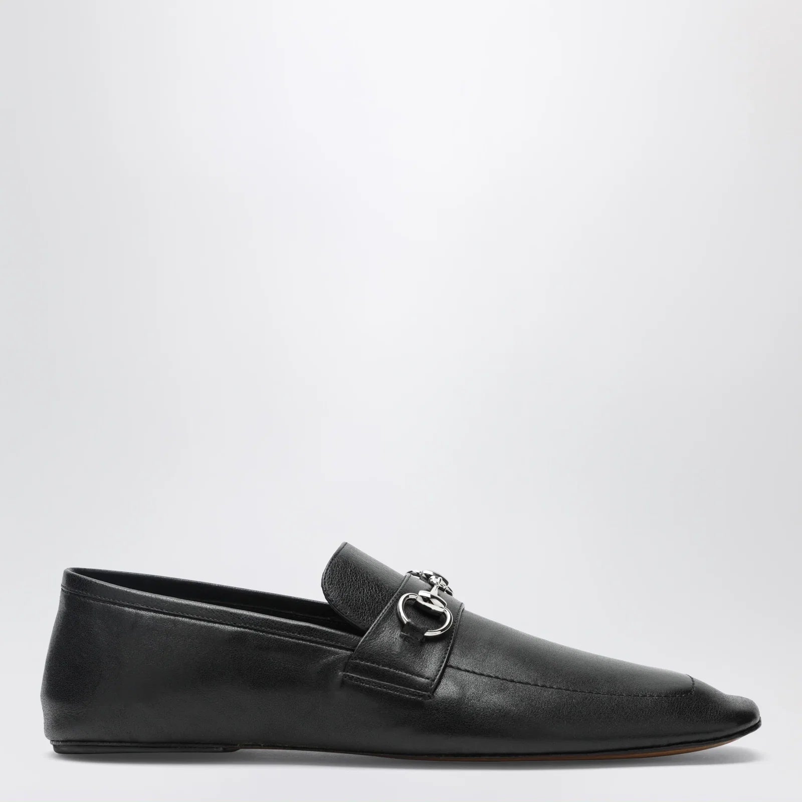 GUCCI Black leather horsebit loafers with silver hardware