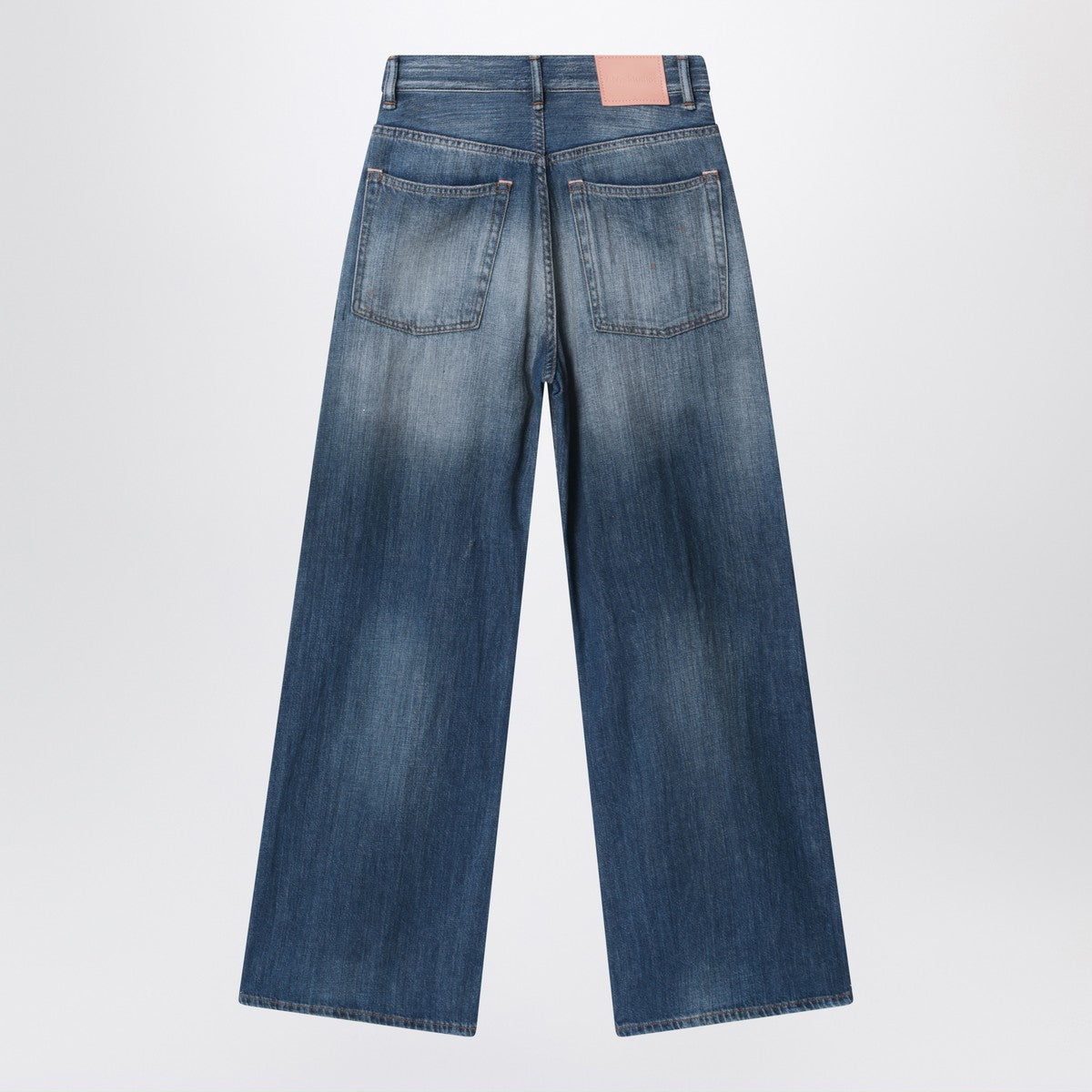 Acne Studios Blue jeans with a faded effect and splashes