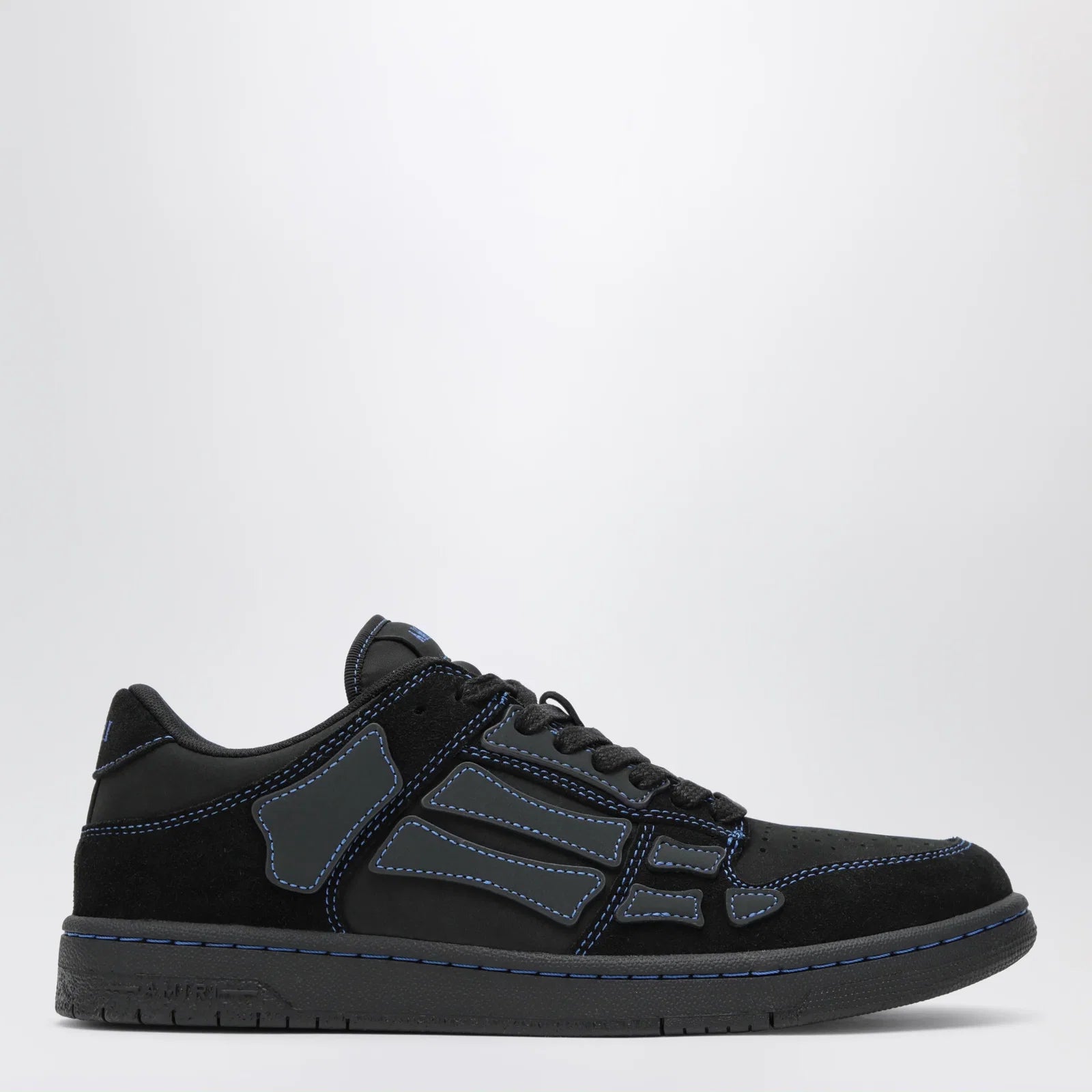 AMIRI Skel low-top sneakers in black calf leather