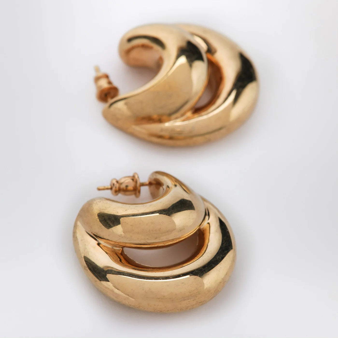 PANCONESI Blow Up Huggies earrings in gold tone
