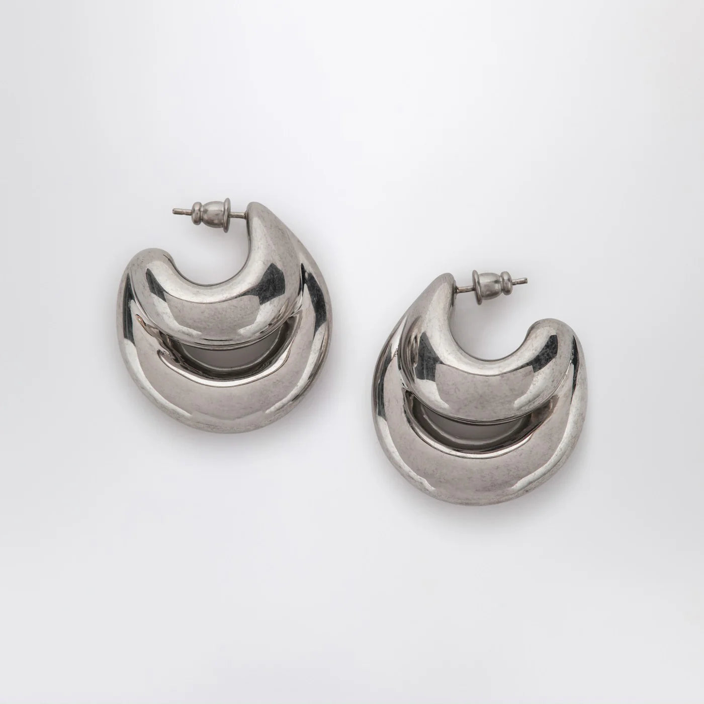 PANCONESI Blow Up Huggies earrings in silver tone