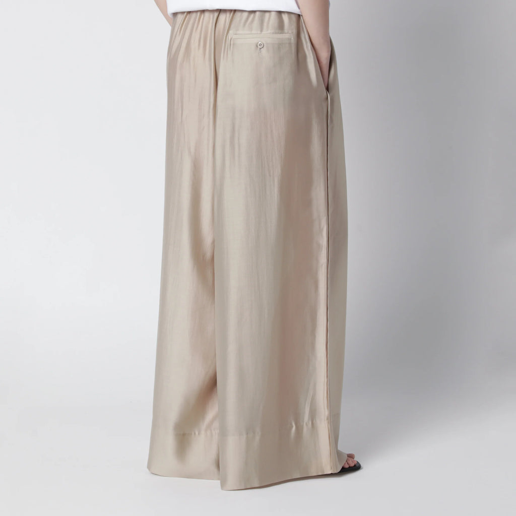Entire Studios Vento wide-leg trousers in champagne color