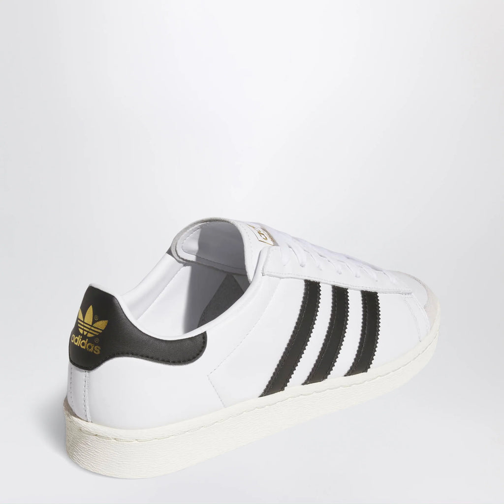 adidas Originals Jabbar Lo sneakers in white and black