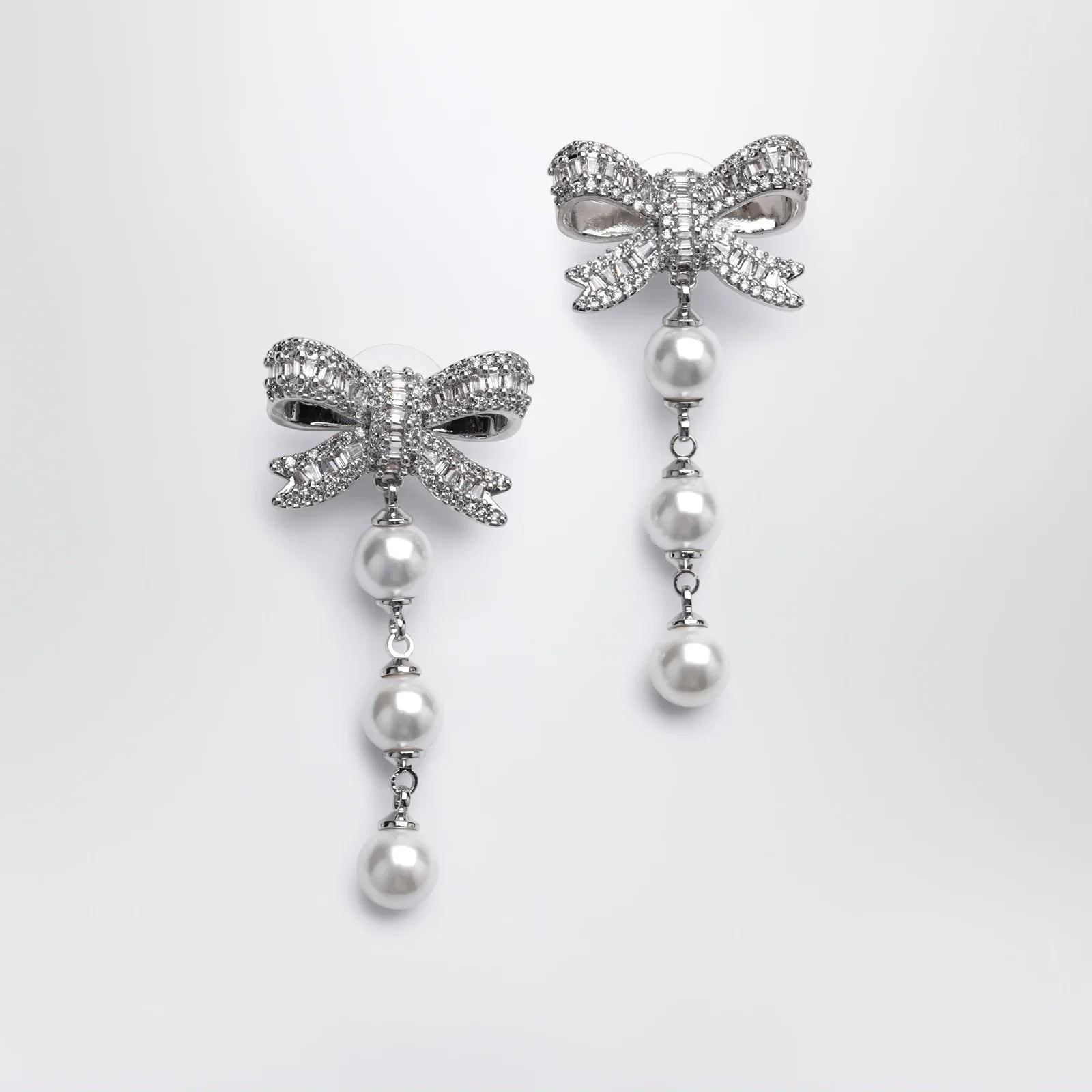 Self-Portrait SELF PORTRAIT Crystal bow and pearl drop earrings in silver