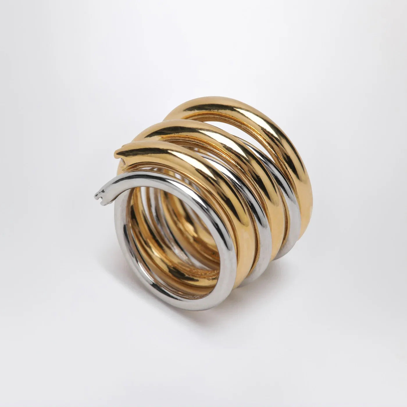 PANCONESI Spiral ring in gold and silver tone