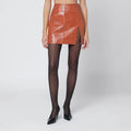 THE ANDAMANE Leather-effect mini skirt in tan